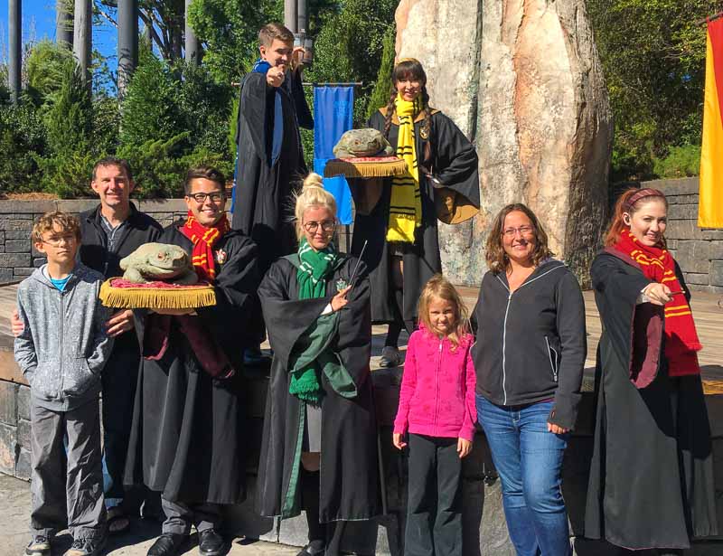 The Wizarding World of Harry Potter family with the frog choir show