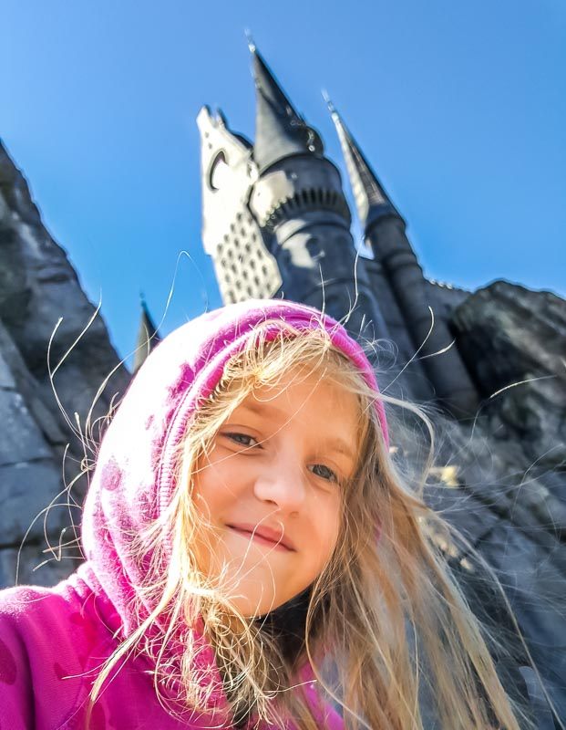 The Wizarding World of Harry Potter girl with Hogwarts Castle