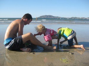 Digging in the Sand at Langosta Beach Costa Rica