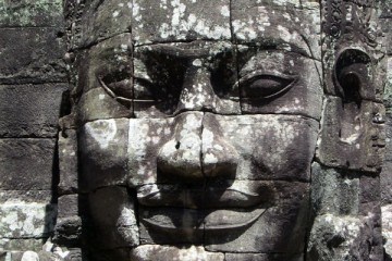 Grey Enegmatic Face at Cambodias Angkor Wat Temple Complex