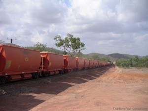 Red Train on Highway by Darwin Australia