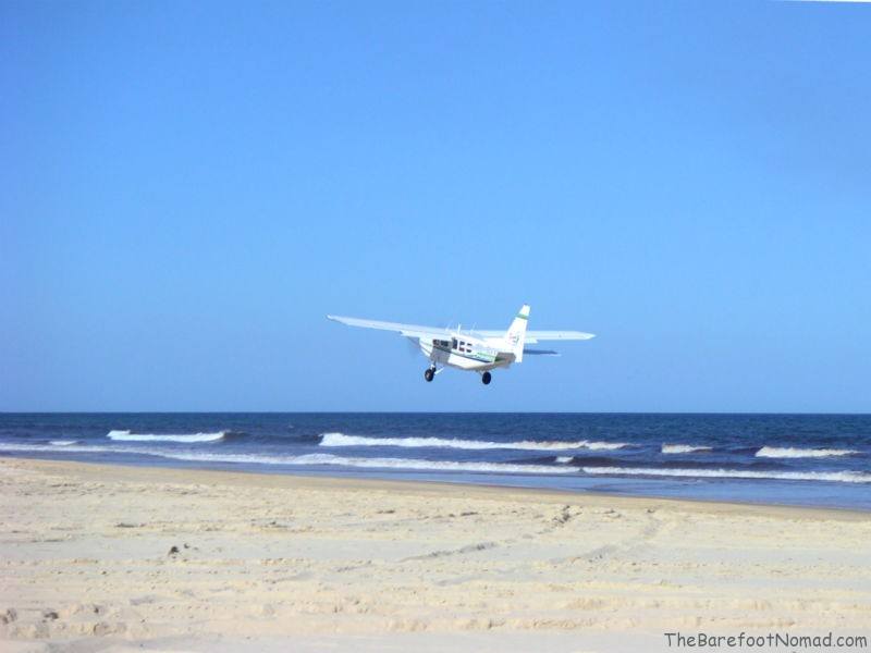 Airplane Landing on 75 Mile Beach