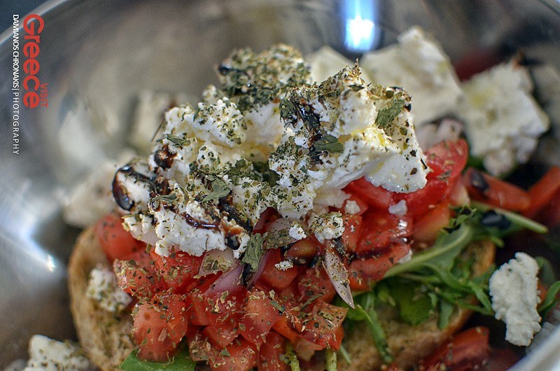 Dakos topped with mythras cheese and oregano