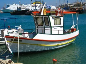 Little white fishing boat at Heraklion Crete