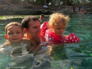 A dip in the Xlakan cenote in Dzibilchaltun
