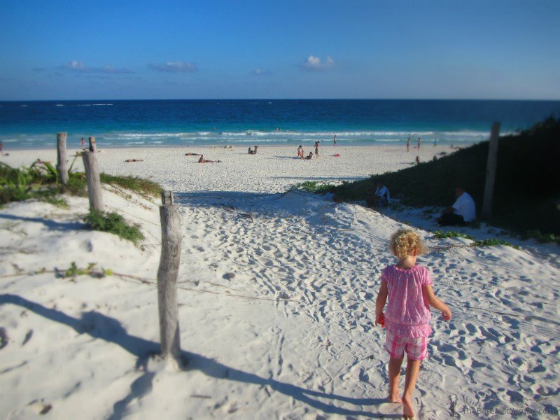 Walking onto Tulum Beach