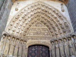 Carvings on a side door of the Cathedral of Avila, Spain