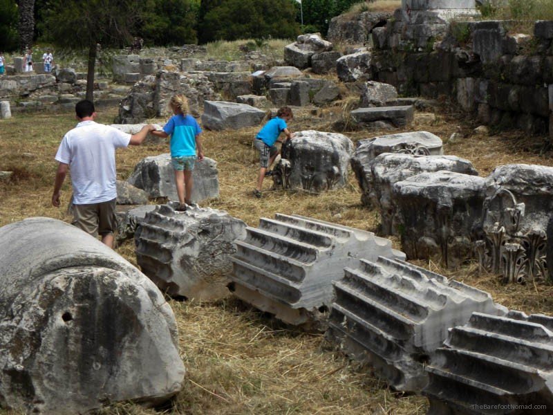 Kids playing on the fallen columns at the Kos Agora Greece