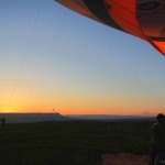 Setting the hot air balloon basket upright at sunrise Goreme Butterfly Balloons