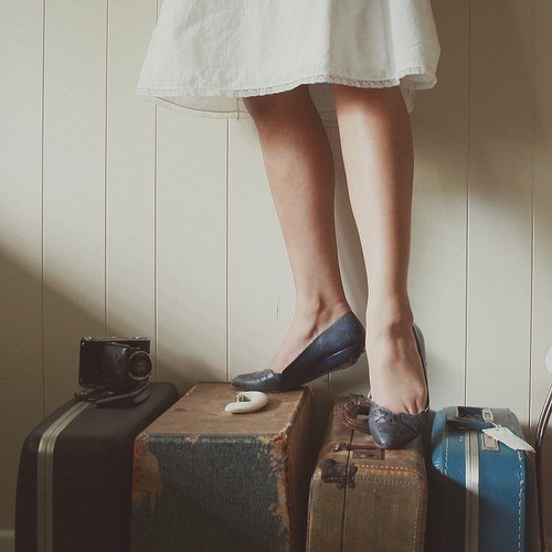 Girl on Suitcases by Hillary Boles