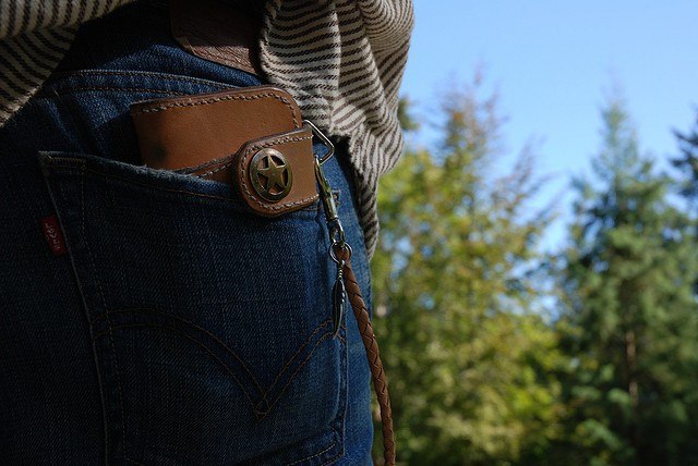 Wallet in back pocket save money by Laura Mason