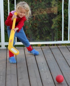 Playing hockey on the back deck