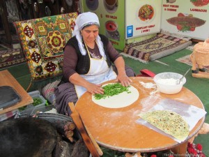 Woman makin borek by hand outside Yildiz Restaurant in Pamukkale