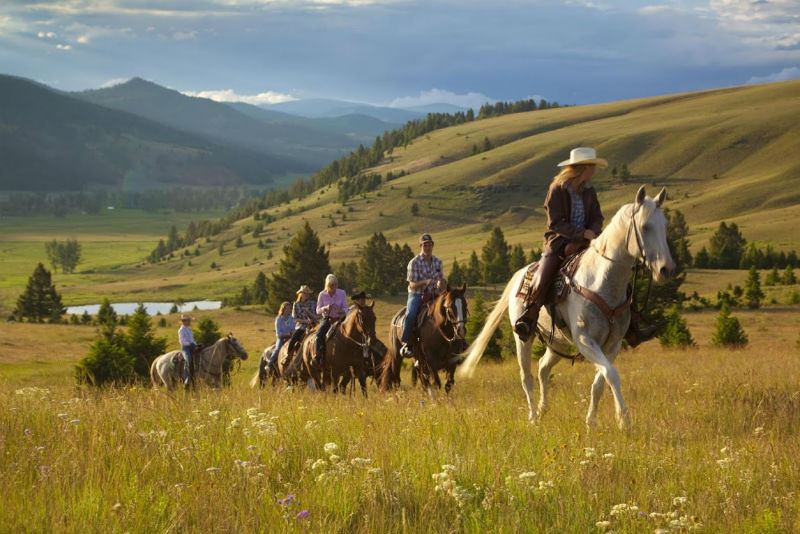 Glamping activities like horseback riding in Montana gets you into nature.