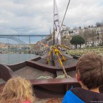 View over the bow on the Douro River in Porto