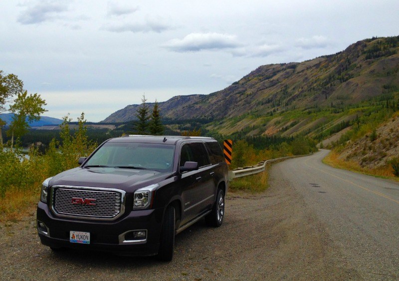 Black 2015 GMC Yukon Denali on a beautiful stretch of of the Klondike highway