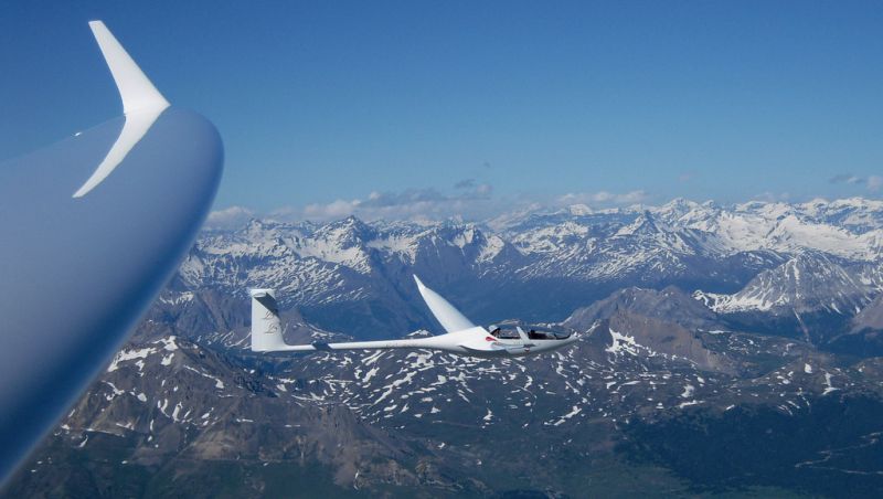 Sailplane over mountains