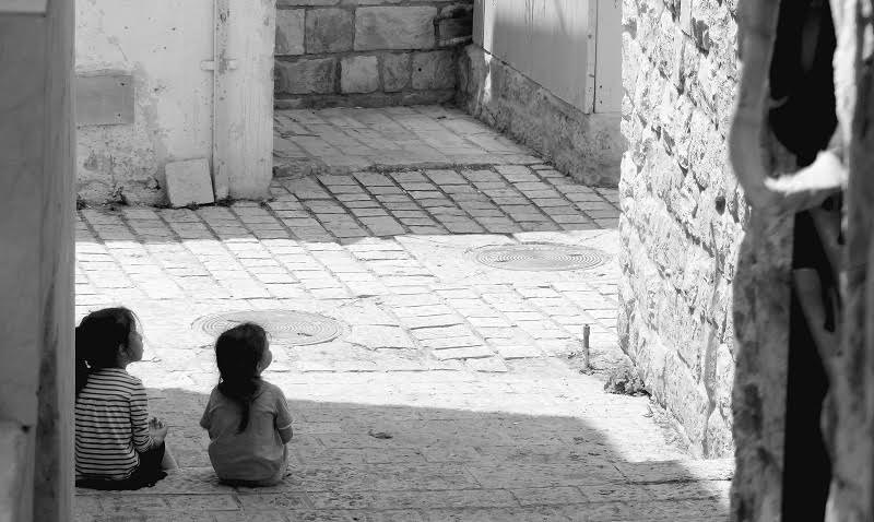 Two children in an alleyway in Tsfat Israel