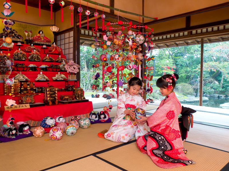 GIrls with colorful Sagemon Ornaments in Japan