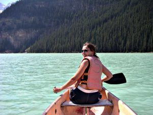 How to travel more - Micki canoeing in Lake Louise