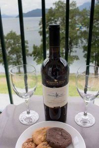 Relaxing on the balcony with wine and cookies at Harrison Hot Springs Resort
