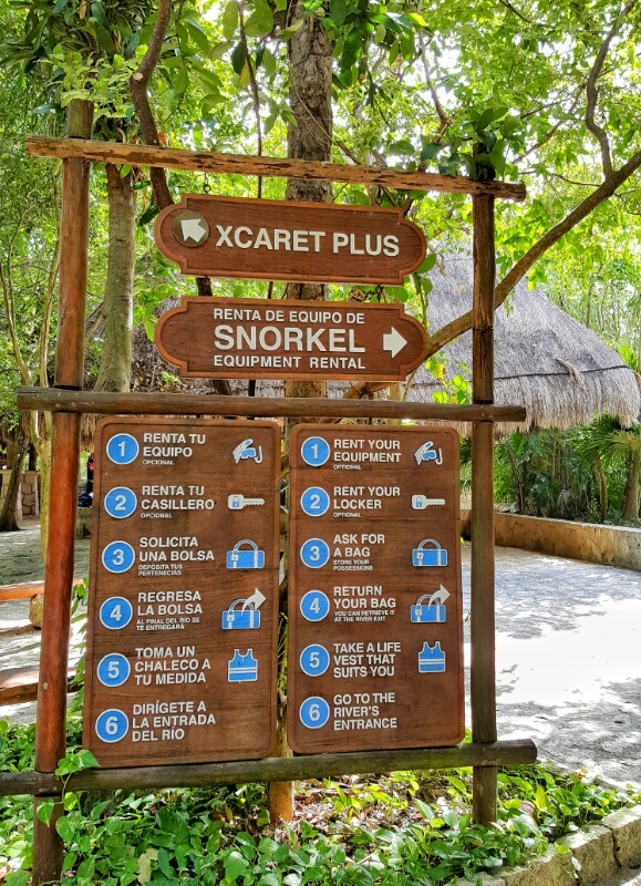 Xcaret Plus signs snorkel locker life vest river entrance