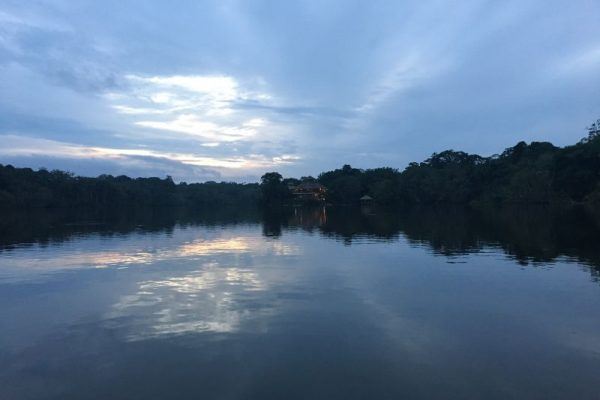 Canoeing Into The La Selva Lodge In The Ecuadorian Amazon