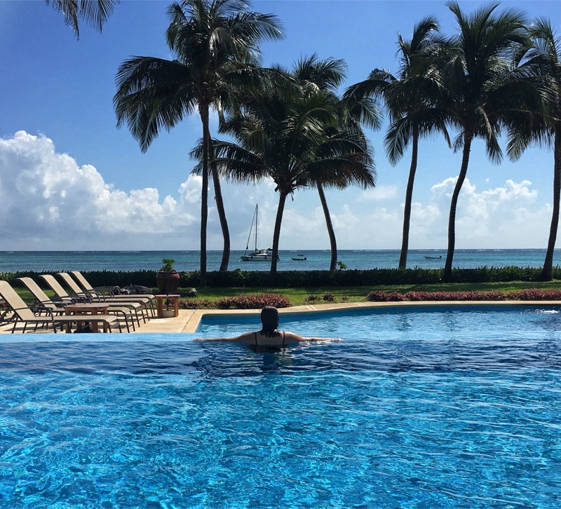 Looking out over the ocean at the infinity pool The Phoenix Belize Resort