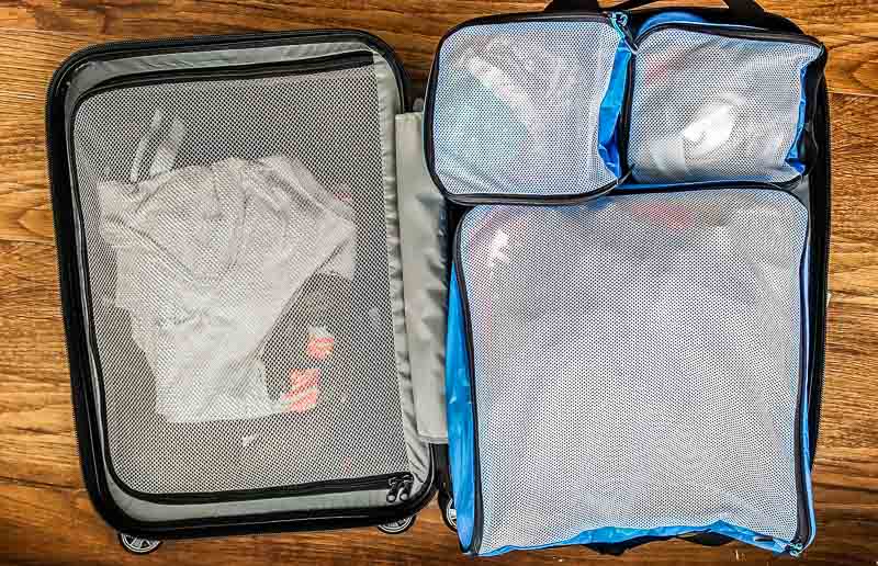 Packed carry on suitcase for a family of four