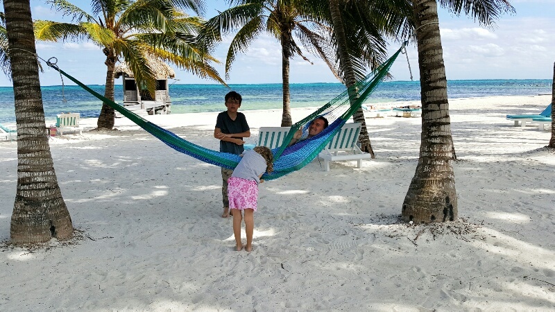 Playing in the hammock at Victoria House Belize