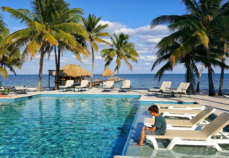 Relaxing in the pool facing the ocean at Victoria House Ambergris Caye