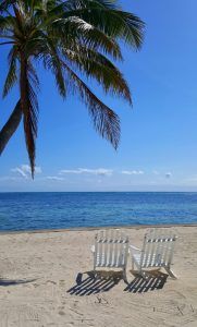 Two chairs by the ocean Victoria House San Pedro Belize