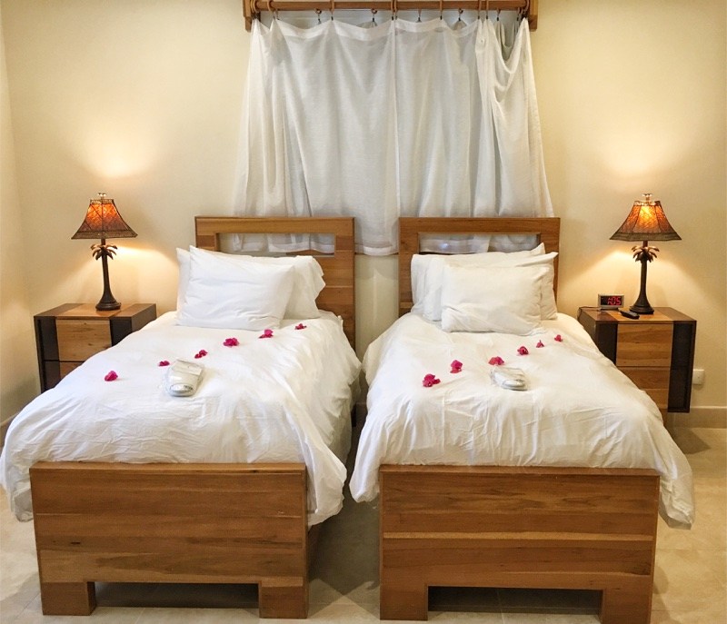 Two single beds at The Phoenix Belize Resort