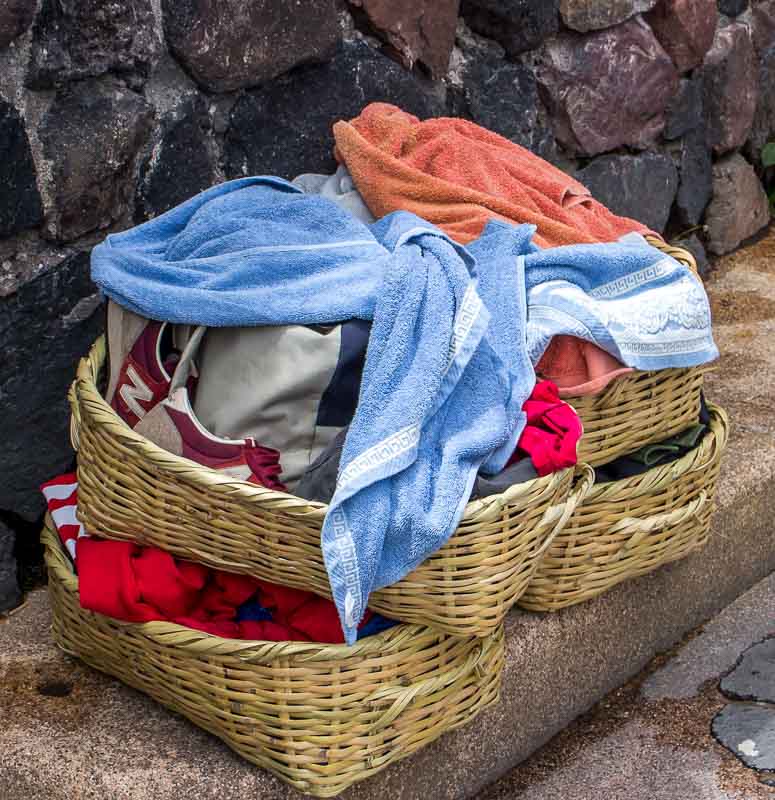 Wicker baskets for belongings in public hot pools Papallacta