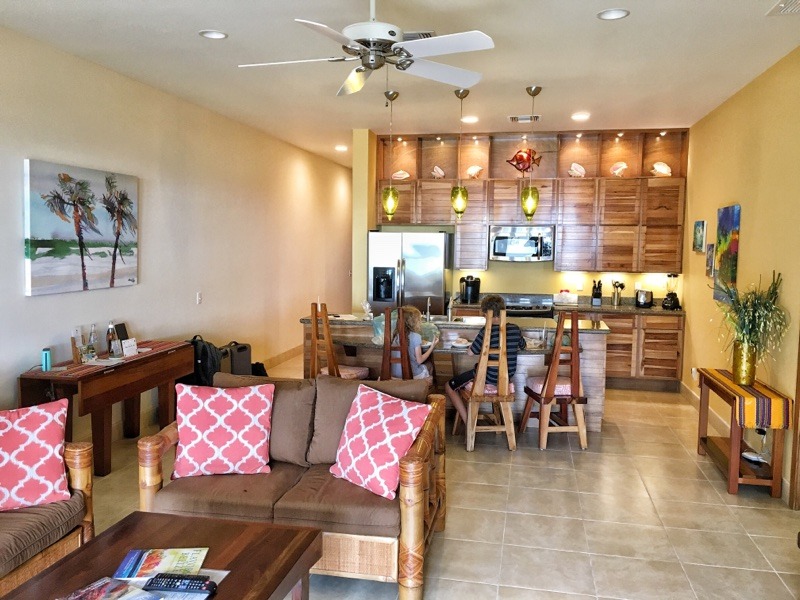 living room and kitchen in two bedroom suite at The Phoenix Belize Resort