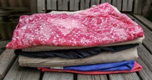 Marks clothing on a bench