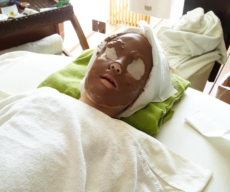 Our little girl enjoying a chocolate facial