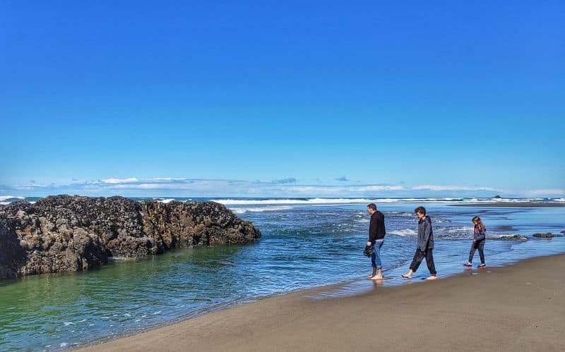 family on beach Oregon Coast by the beach Lincoln City