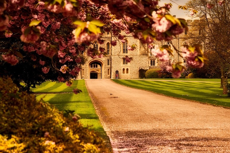 Windsor Castle England with fall foliage and guard in background