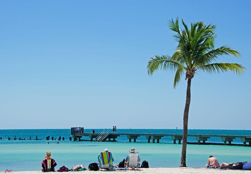 People overlooking boardwalk on beautiful Higgs Beach Key West DP one of the very best beaches in the Florida Keys USA