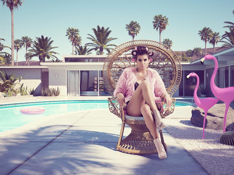 Palm Springs a great weekend escape from LA - pic of flamingos and woman in curlers by the pool 