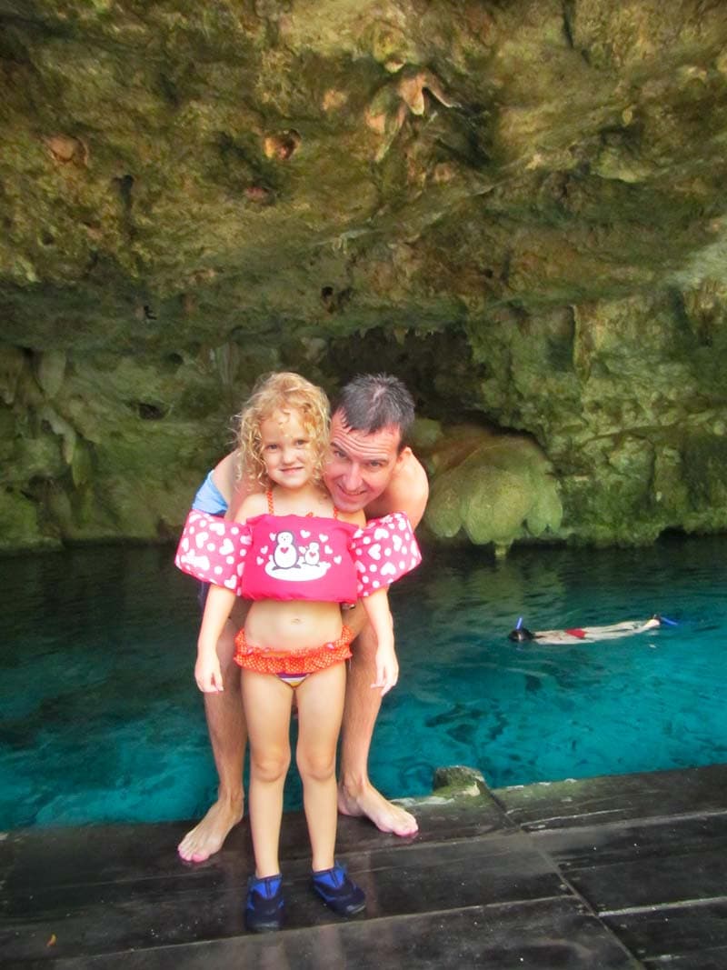 jumping off platform at Dos Oyos in Mexico