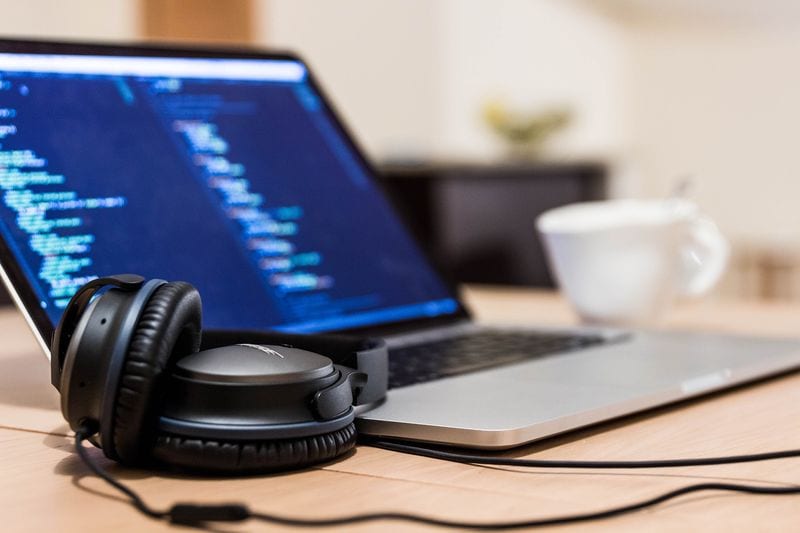 headphones computer and coffee