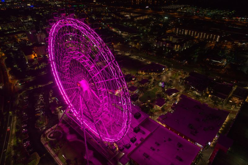 Things to do at ICON Park Orlando Eye Ferriss wheel at night at ICON Park Orlando