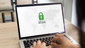 Laptop with Private Internet Access on screen hands typing