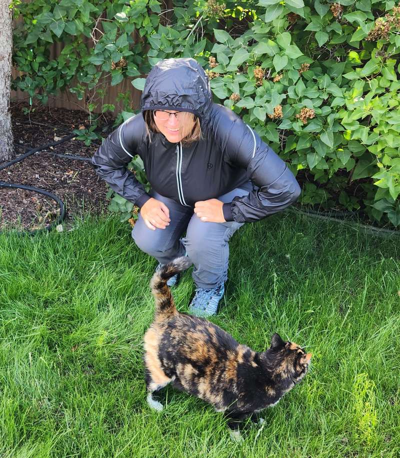 Reviewing the Graphene X nomade jacket in garden cat helping