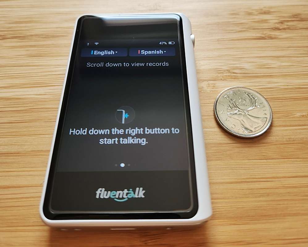 Size of the Fluentalk T1 Mini Handheld Translator with quarter for scale