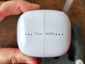 Timekettle M3 language translator earbuds charging case closed