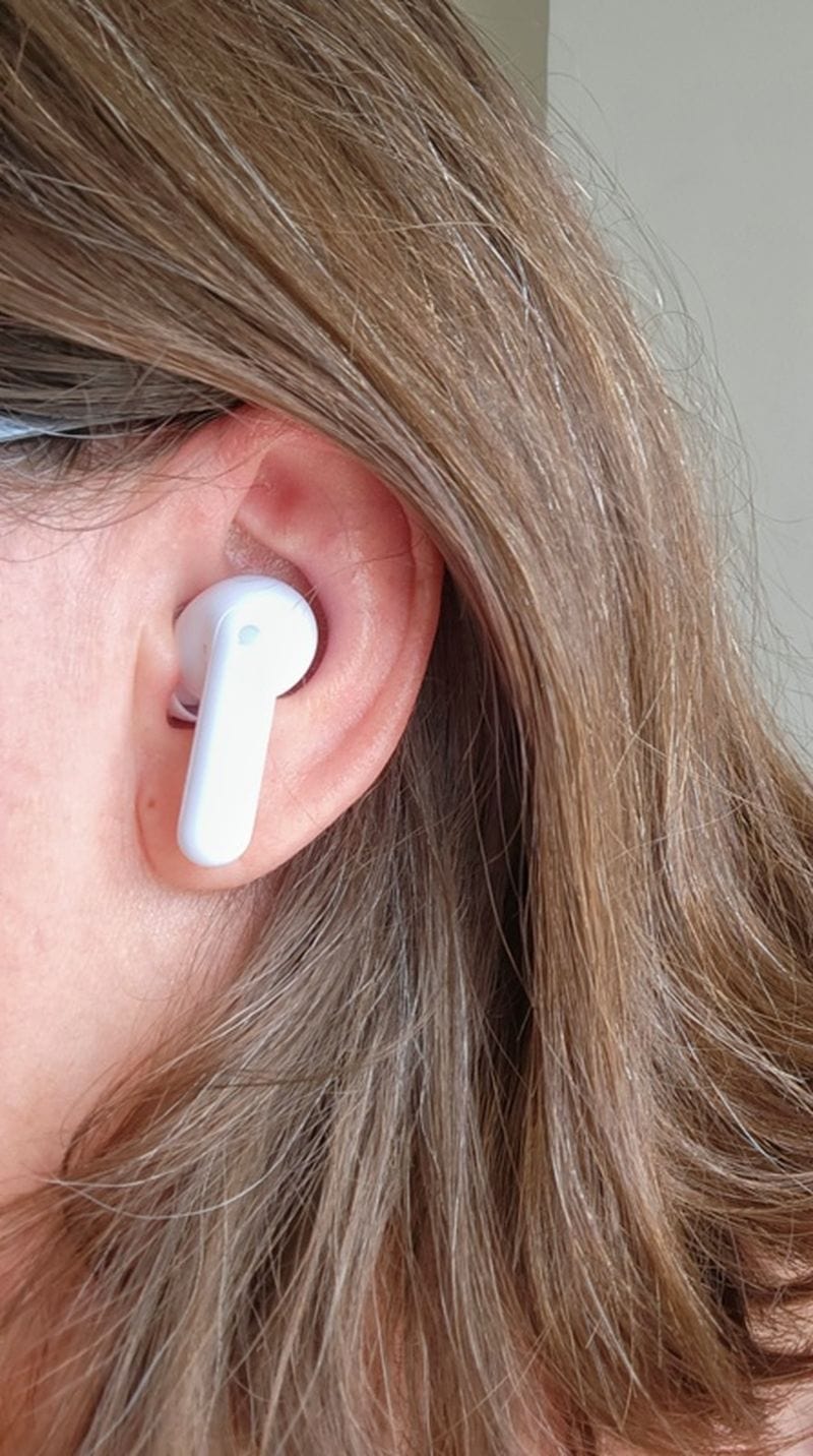 What the Timekettle M3 language translator earbuds look like in use