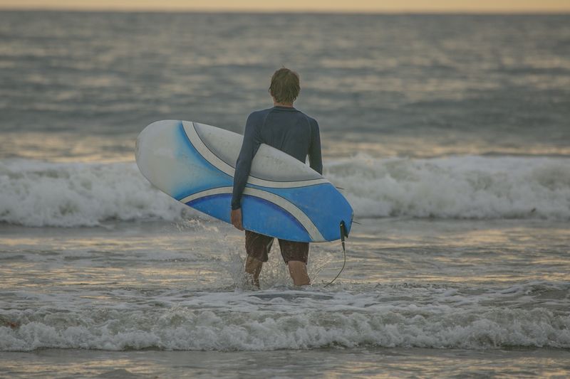 Surfing on Tamarindo Beach Costa Rica